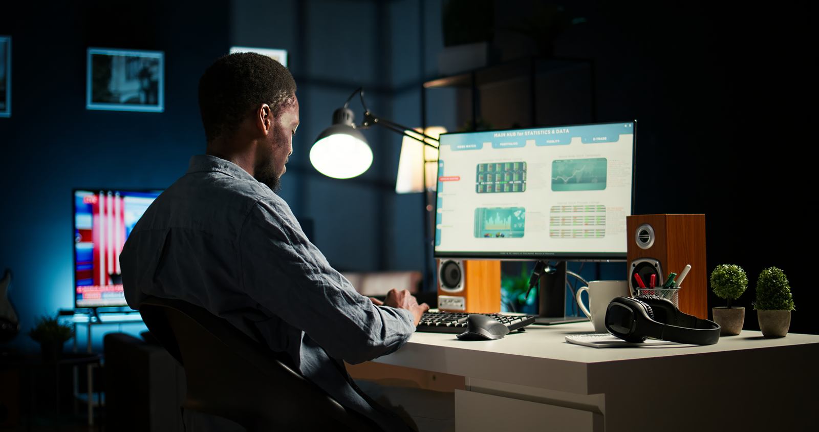 A trader reviewing market data at a workstation